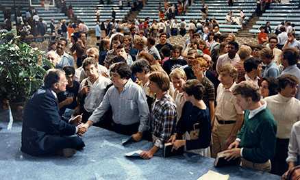 Billy Graham talking to students